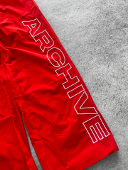 ARCHIVE 'STATEMENT' NYLON PANTS - RED